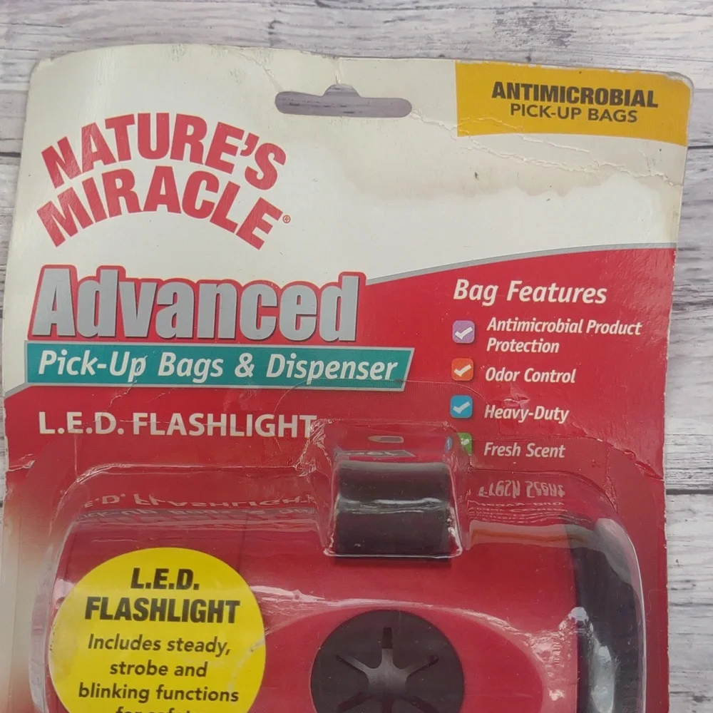 Pickup dog bags with flashlight